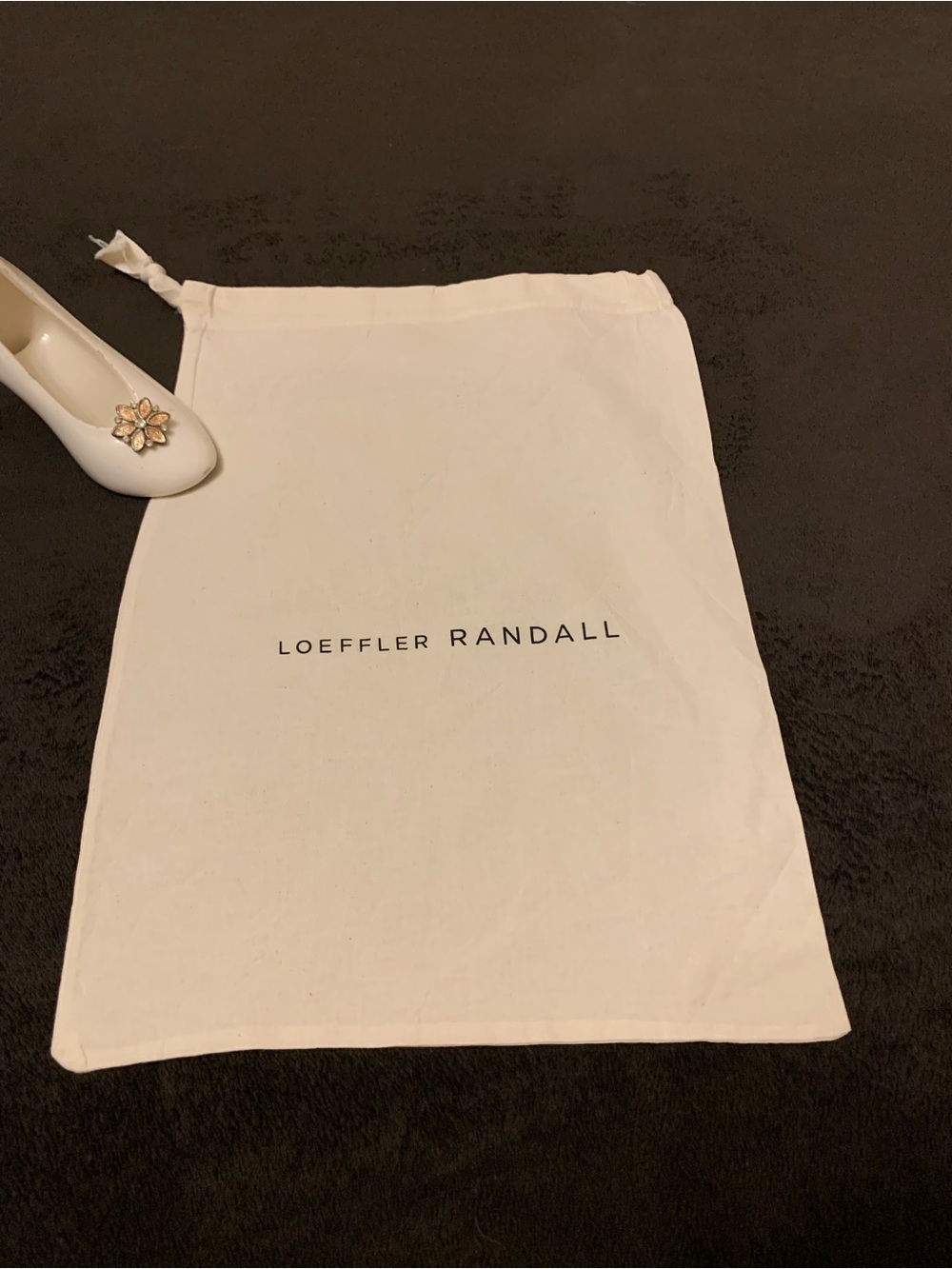 LOEFFLER RANDALL creme’ color smaller drawstring dust bag